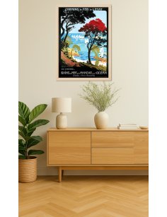 Affiche rétro "Côte d'Émeraude" de Julien Lacaze encadrée dans un intérieur sur le thème marin